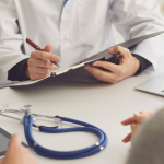 An occupational health technician conducting a safety critical medical. Official Compass photo for the Level 3 Certificate for Occupational Health technicians.
