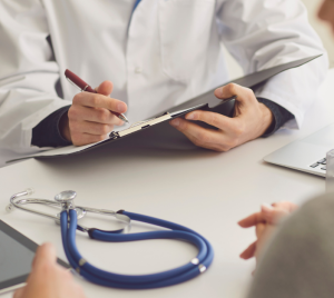 An occupational health technician conducting a safety critical medical. Official Compass photo for the Level 3 Certificate for Occupational Health technicians.